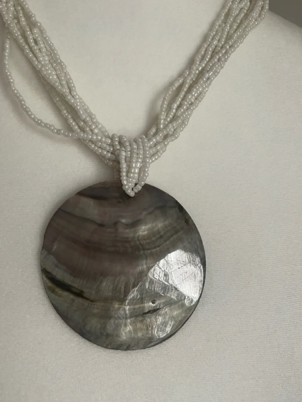 White Beaded Necklace with Iridescent Shell Pendant